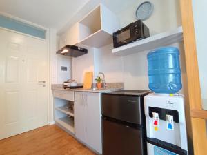 Studio Condo 3 mins to Mactan Airport with Pool and Gym