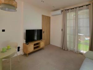 Appartements Studio Le Faubourg - clim : photos des chambres