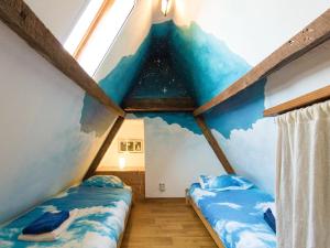 Maisons de vacances Farmhouse with private pool, large garden and playground : photos des chambres