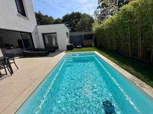 Maisons de vacances Maison 4 chambres piscine : photos des chambres