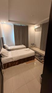 الجوهرة البيضاء للشقق المخدومة