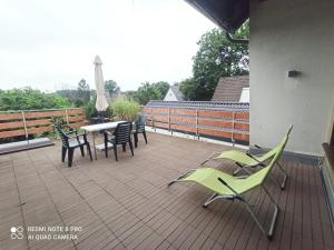 Gemütliche Ferienwohnung mit großer Dachterasse in gehobener Wohngegend