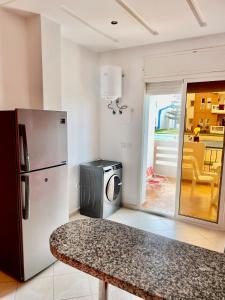 Appartement à Sidi Rahal Piscine et Accès direct plage