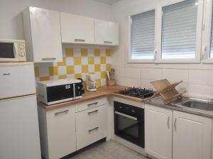 Chez STEF Proche Palais des Congrès, WIFI, Parking privé