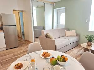 Appartements Le Cocon de Charme-Literie de qualite-Neuf-Central : photos des chambres