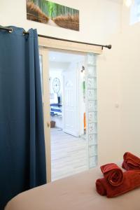 Appartements Le Rimbaud T2 dans le centre historique : photos des chambres