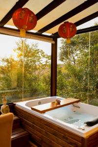 Chalé Romântico com Jacuzzi Próximo ao Templo Budista