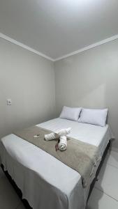 Casa com 2 Quartos Climatizados e Garagem