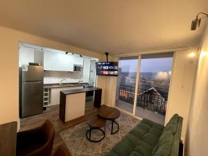 Cozy apartment with a view of the Volcanoes and Villarrica Lake