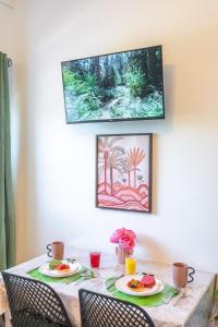 Appartements L-Exotique - Parking I Netflix I Gare I WIFI TRES HAUT DEBIT - Calme & Cosy : photos des chambres