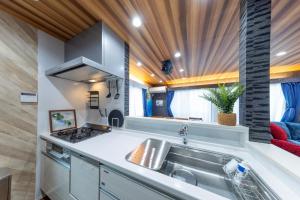 3 minutes from Sangenjaya 90square meters 50square meters rooftop 3LDK Relaxing Tokyo stay with rooftop, jacuzzi projector