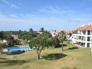 Sunny Balcony Apartment and Pool