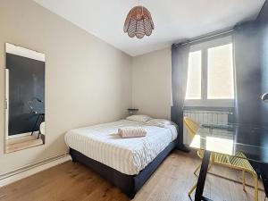 Appartements Le Cosy Genin - 3 Chambres Bureaux Parking : photos des chambres