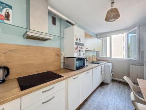 Appartements Le Cosy Genin - 3 Chambres Bureaux Parking : photos des chambres