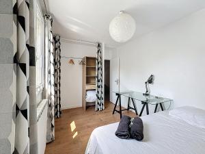 Appartements Le Cosy Genin - 3 Chambres Bureaux Parking : photos des chambres