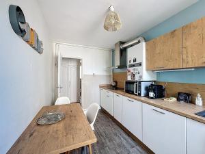 Appartements Le Cosy Genin - 3 Chambres Bureaux Parking : photos des chambres