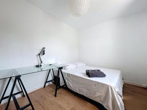 Appartements Le Cosy Genin - 3 Chambres Bureaux Parking : photos des chambres