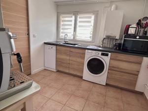 Appartements Cosy Appartement near Disneyland & Paris : photos des chambres
