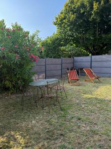 Maisons de vacances Maison cosy avec superbe veranda : photos des chambres