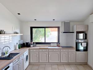 Maisons de vacances Maison cosy avec superbe veranda : photos des chambres