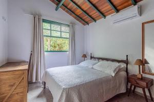 Camburi 5 quartos com piscina natural