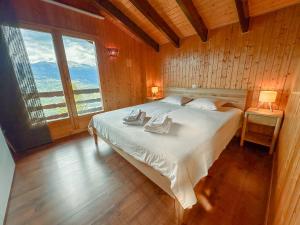 Chalet lAiglon Valais - Vue, Confort, Jacuzzi