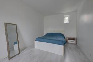 Maisons de vacances Maison avec jardin et parking : photos des chambres