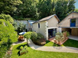 Maisons de vacances la Maison sous les Arbres - Duplex, jardin et spa : photos des chambres