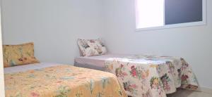 Casa em condomínio - 2 quartos - 2 vagas de garagem