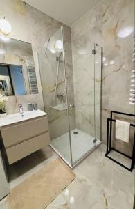 Lotus Apartments Impero oddzielna kuchnia 2 pokoje garaż