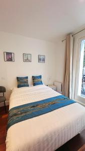 Sejours chez l'habitant Le coeur du Paris, Centre Pompidou, Marais : photos des chambres