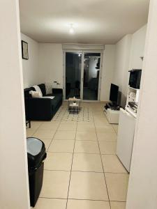 Appartements Cozy T2 with terrace, TCL access : photos des chambres