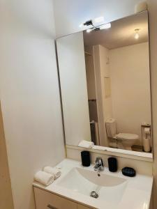 Appartements Cozy T2 with terrace, TCL access : photos des chambres