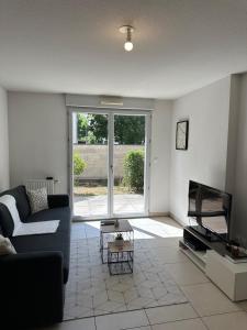 Appartements Cozy T2 with terrace, TCL access : photos des chambres