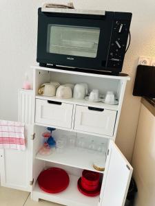 Appartements Cozy T2 with terrace, TCL access : photos des chambres