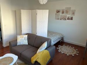 Appartements T1 Bis a Deux Pas du CNTS Comfort & Praticite : photos des chambres