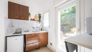Appartements Spacieux appartement avec terrasse a 5min a pied de la gare : photos des chambres