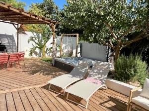 Maisons de vacances Maison avec jacuzzi a 15 minutes a pied de la plage : photos des chambres