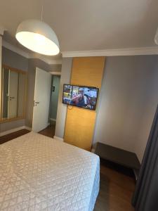 Hotel Aeroporto Congonhas com cozinha e sacada 1108 S