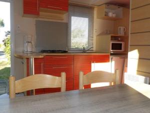 Mobil home pour 6 personnes avec terrasse - API-1-52-390