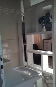 Kitnet versátil e acolhedora