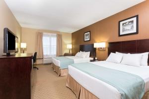 Queen Room with Two Queen Beds - Disability Access/Non-Smoking room in Days Inn by Wyndham Palm Coast