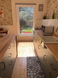 Appartements La bastide aux Iris - Les Capucines : photos des chambres