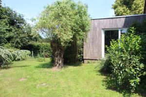 B&B Even Heukelom - Kamer met Tuin