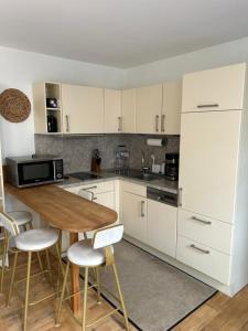 Einliegerwohnung mit Wintergarten (EG)