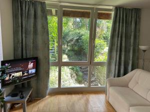 Einliegerwohnung mit Wintergarten (EG)