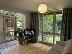 Einliegerwohnung mit Wintergarten (EG)