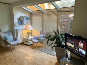 Einliegerwohnung mit Wintergarten (EG)