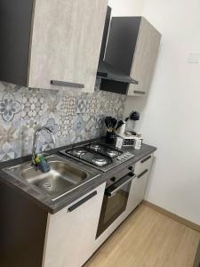 Mondello beach house with terrace 2 steps from the sea