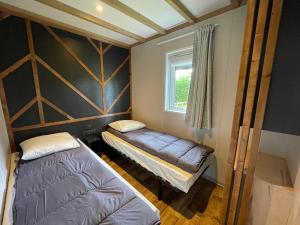 Campings Chalet Camping du grand fay : photos des chambres